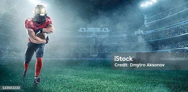 American Football Player Stock Photo - Download Image Now - College American Football, Stadium, Sports Field