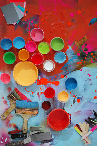 istock Colorful Painted Canvas With Brushes and Paint Cans 533502633
