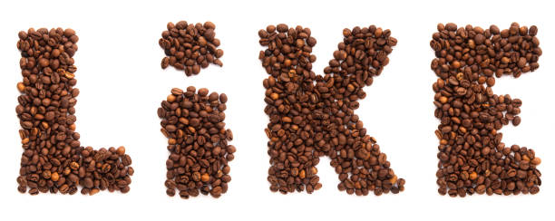 istock Like inscription from roasted coffee beans isolated on white background 533503189