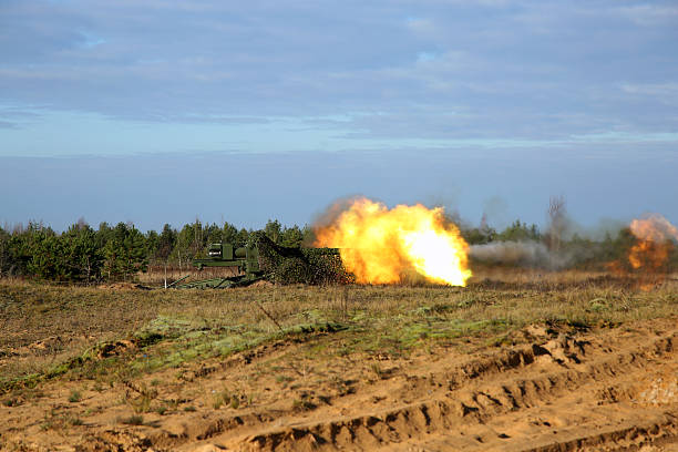 istock shot of artillery fire with flash 533503289