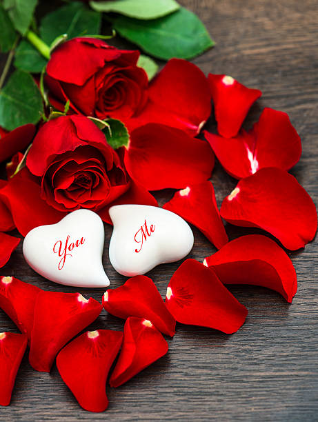 istock Red roses and two hearts. Valentines Day 533503533