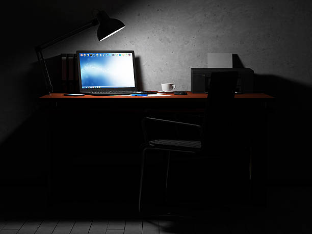 istock Place of Work at Night with Office Equipment and Accessories 533518077