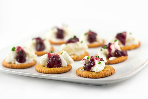 istock Crackers with Cream Cheese Grape Jelly and Chives 533519931
