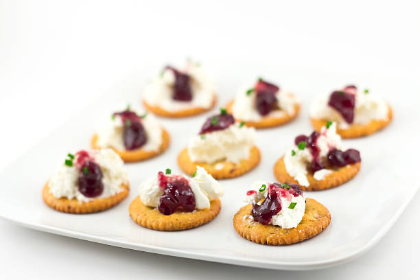 istock Crackers with Cream Cheese Grape Jelly and Chives 533519959