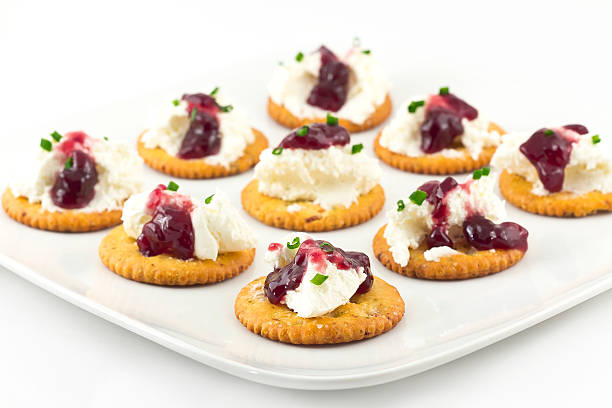 istock Crackers with Cream Cheese Grape Jelly and Chives 533519977