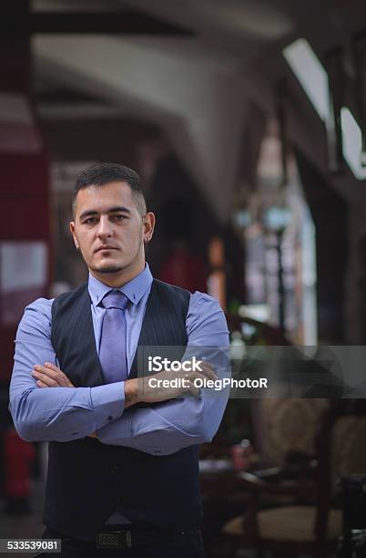 The Thoughtful Young Man In A Vest Stock Photo - Download Image Now - 2015, Adult, Adults Only