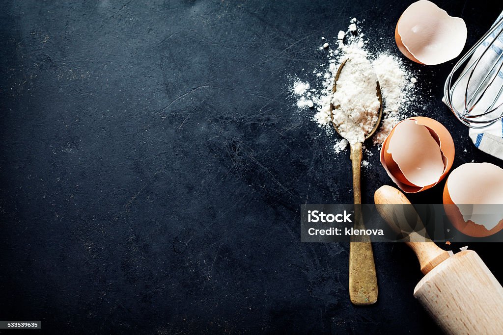 baking background baking background with eggshell and rolling pin Baking Stock Photo