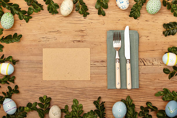 istock Easter decoration, blank, card, napkin, knive and fork on wood 533552521