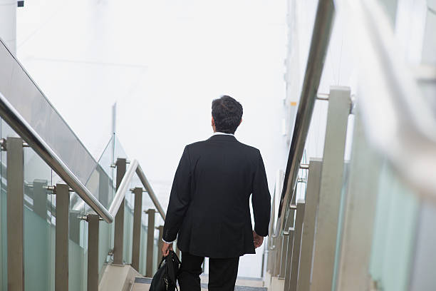 istock Indian businessman descending steps 533552951