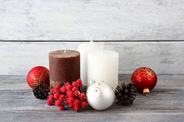 istock Christmas balls with candles and cones 533554841