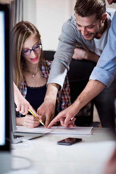 istock Happy colleagues in the office 533555694
