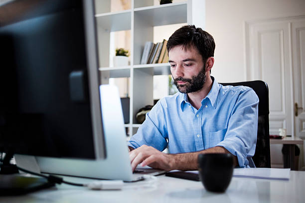 istock Businessman using laptop in the office 533555794
