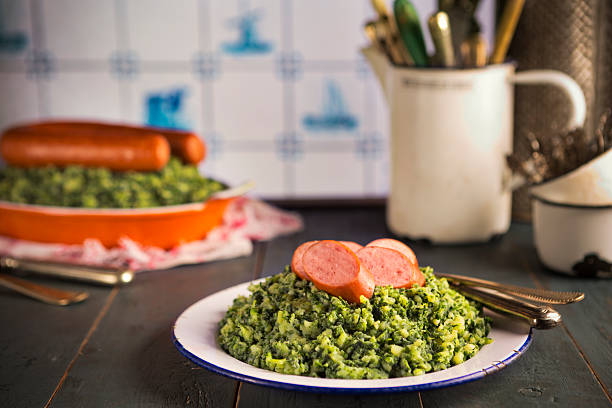 Dutch food: kale with smoked sausage or 'Boerenkool met worst' stock photo