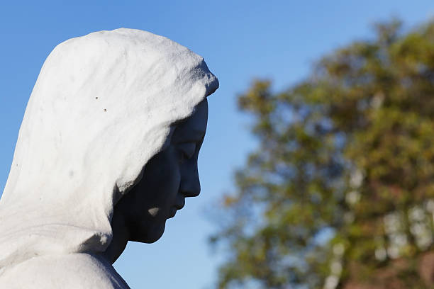 istock Profile white marble head of angel 533556303
