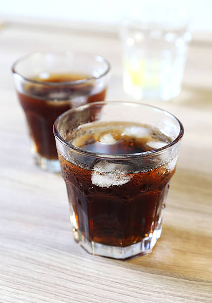 istock Glass of cola with ice 533556976