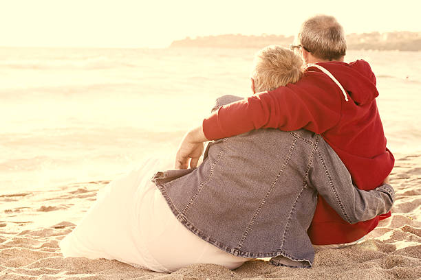 istock Mature couple on beach 533557083