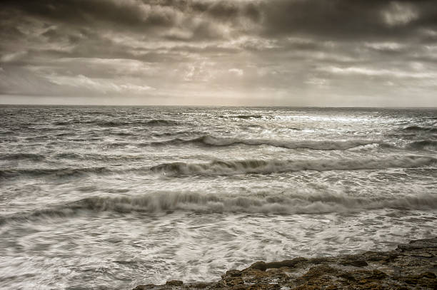 istock Ocean Waves Off California Coast and Storm Clouds 533557826