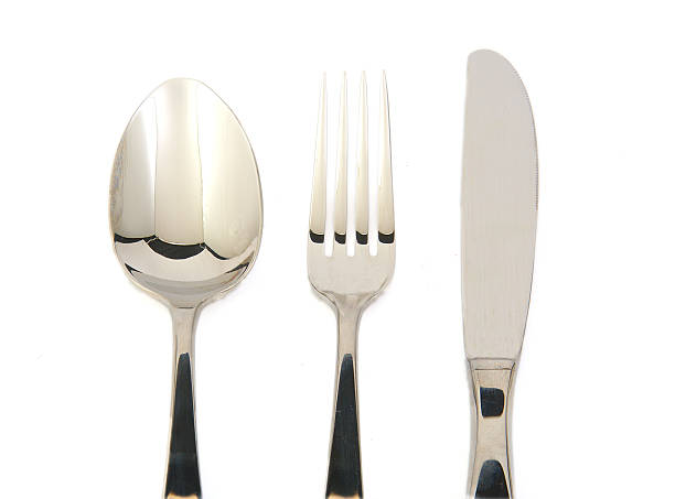 istock Metal fork, knife and spoon on white background. 533558919