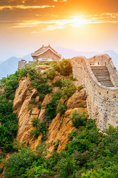 The magnificent Great Wall of China in the sunset The majestic magnificent Great Wall of China in the sunset jinshangling stock pictures, royalty-free photos & images