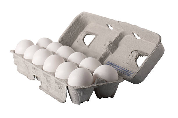 Egg Carton - Angled A carton of a dozen fresh eggs, angled view carton stock pictures, royalty-free photos & images