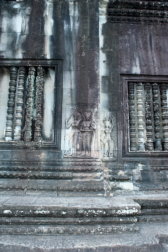 Stone carvings on wall at Angkor Wat 