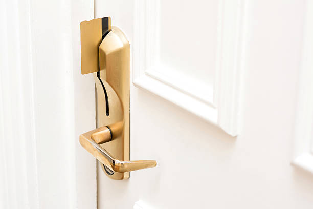 istock Card key inserted in modern door lock 533562386