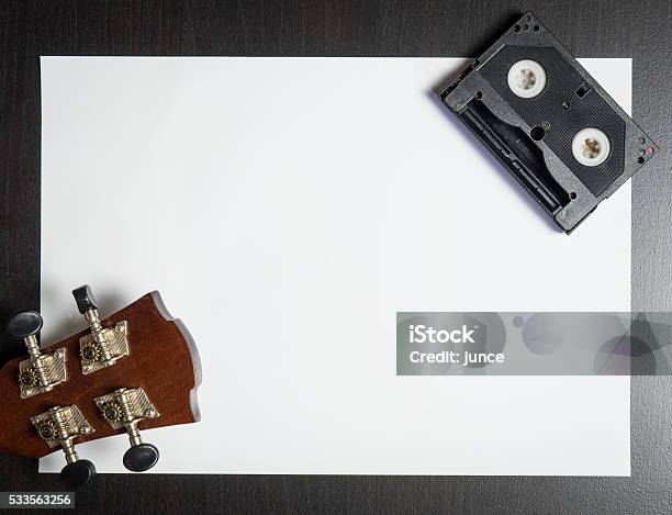 Uitar Head With Video Tape On White Paper With Space Stock Photo - Download Image Now