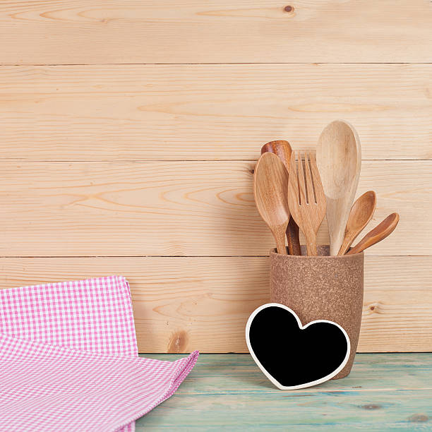 istock kitchen utensils, wood spoons in coffee mugs on 533566442