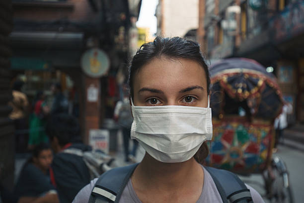 istock Young tourist with mask 533566858