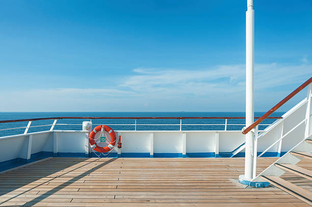 Ship deck, buoy and blue ocean stock photo