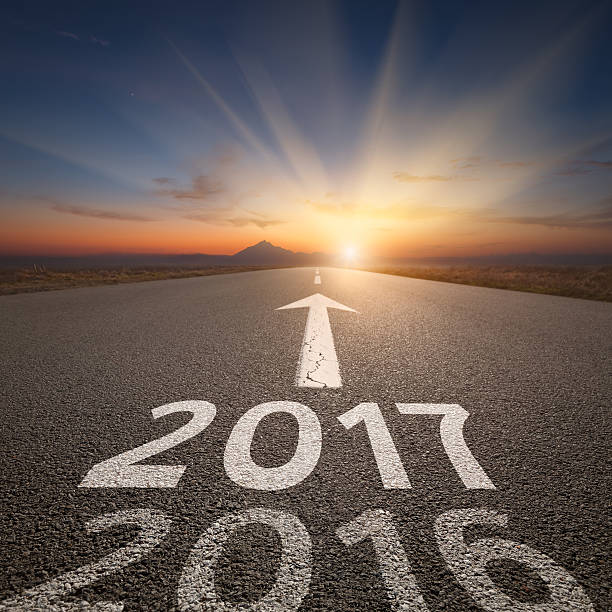istock Straight open road to upcoming 2017 at idyllic sunset 533571382