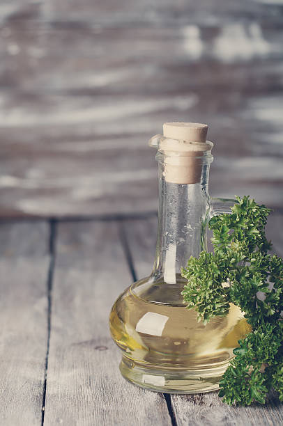 istock Olive oil with herbs . Toned photo 533574670