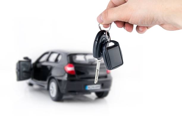istock Hand holding keys to new car 533574697