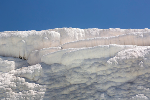 Pamukkale white mountain in Turkey in the middle of the summer