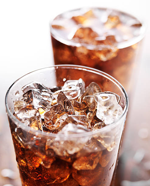 istock glass cup of cola soda with ice 533575155