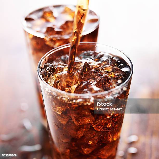 Soft Drink Being Poured Into Glass Stock Photo - Download Image Now - Soda, Cola, Drinking Glass