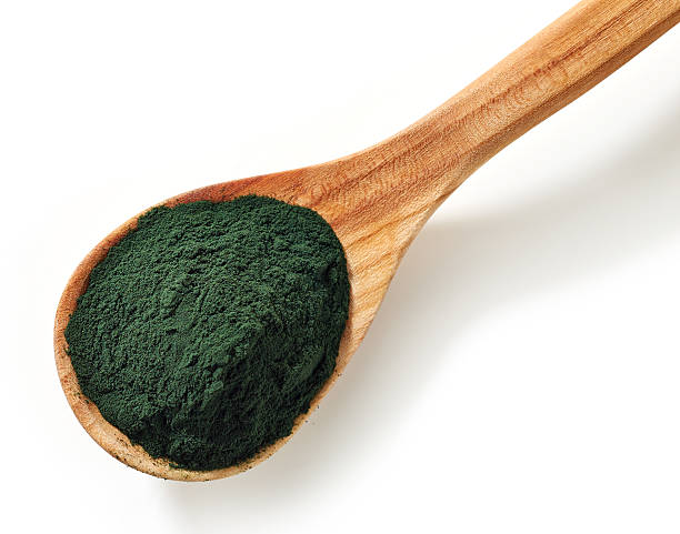 スピルリナ海藻パウダー - spirulina bacterium ground algae mineral ストックフォトと画像