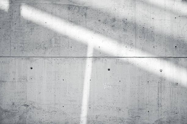 istock Horizontal Photo Blank Grungy Smooth Bare Concrete Wall with  Sunrays 533577324