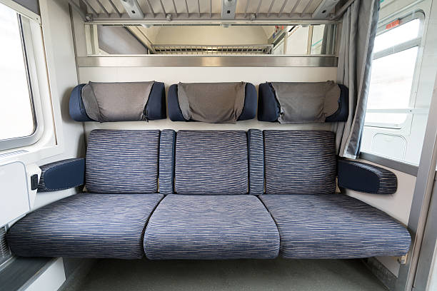 現代ヨーロッパの列車の3つの隣接する空席 - bus inside of people train ストックフォトと画像
