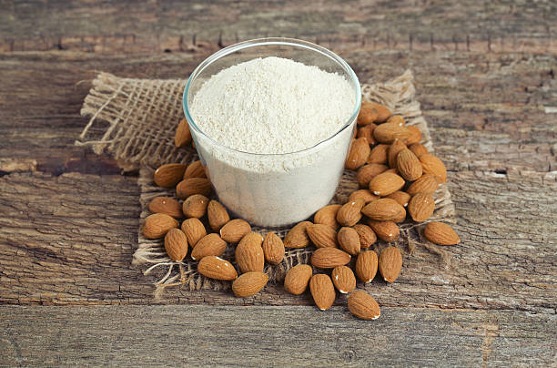 istock almond flour on wooden surface 533577683