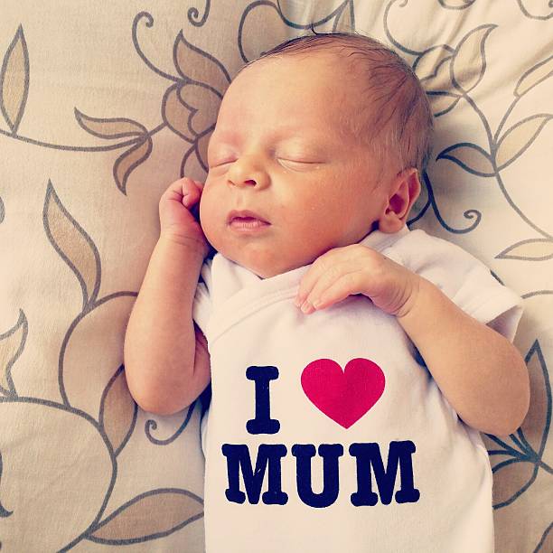 istock Mother's day cute newborn 533578121