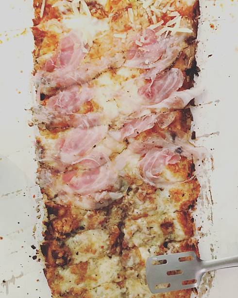 This is a one meter long pizza, by an Italian pizzeria in Salerno, south of Italy.