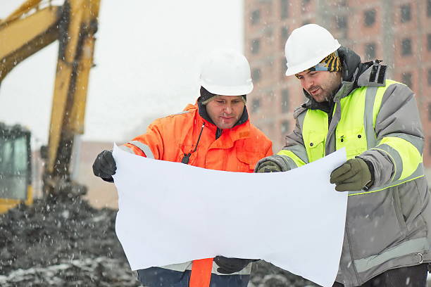 istock Civil Engineers At Construction Site In Winter Season 533578405