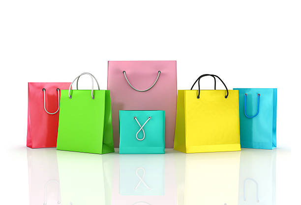 istock Assorted colored shopping bags including yellow 533578896