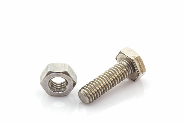 istock Metal screw and nuts on white background. 533579457