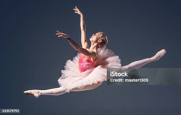 Beautiful Female Ballet Dancer On A Grey Background Ballerina Is Stock Photo - Download Image Now