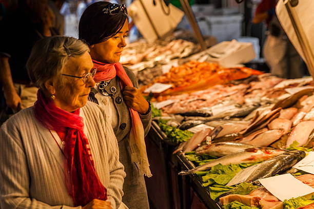 istock Women at the Venice market 533580237