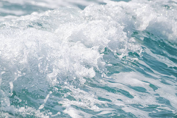 fondo de onda de agua al mar, mar azul textura con olas. - sea high angle view water tranquil scene fotografías e imágenes de stock