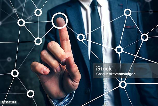 Businessman Connecting The Dots In Business Project Management Stock Photo - Download Image Now