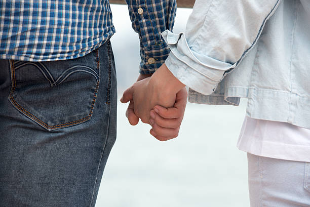 istock Girl and boy holding hands 533581810